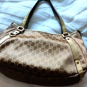 Gucci gold handbag authentic